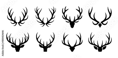 Collection of black deer antlers and heads silhouettes white background