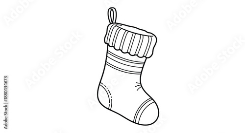 Traditional christmas stocking featuring striped patterns and a folded cuff with a loop for hanging during holiday celebrations.