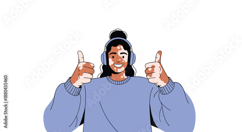 Happy young person with vitiligo wearing blue headphones and giving a double thumbs up gesture while smiling on a white background.
