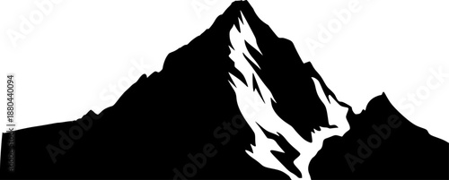 Dramatic Black and White Silhouette of a Jagged Mountain Peak with Snow Accents and High Altitude Alpine Summit