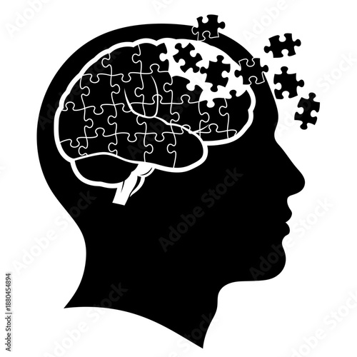 A human head silhouette with a brain composed of puzzle pieces