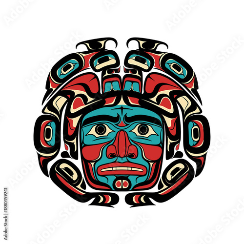 Intricate Indigenous Northwest Coast art depicting a stylized face with symmetrical designs in red, black, and turquoise.