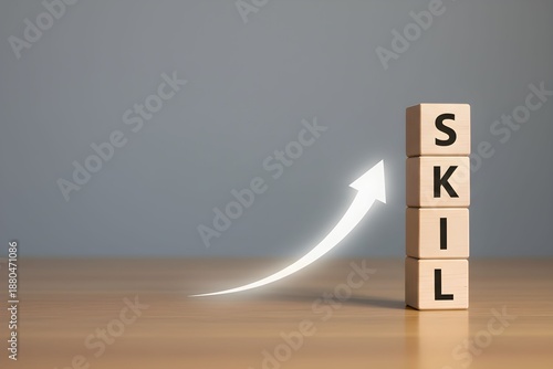 Wooden blocks stacked with skill letters show growth on table
