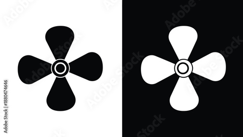 A black fan blade is on a white background and a white fan blade is on a black background.