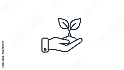 A hand holds a small plant growing from soil in a symbol of growth and nurturing.
