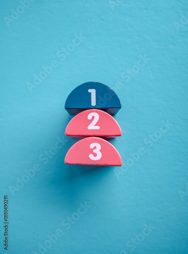 Wooden blocks with numbers first, second, and third. Task priority and management concept. The order of priority in any activity. Set work priority.