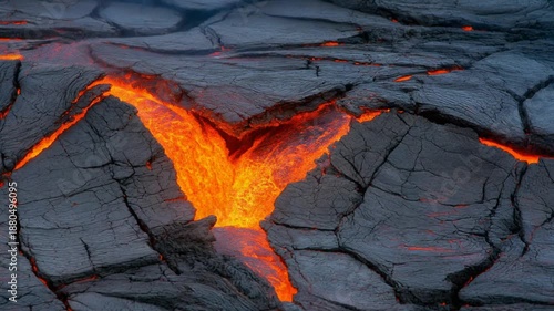 Molten lava flowing through cracked earth.