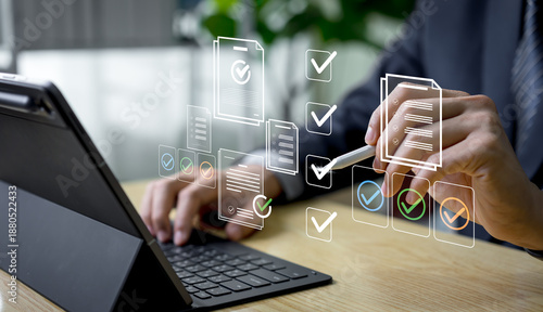 Businessman verifies and manages digital paperwork on a laptop using an automated system, expressing document approval, quality control, and efficient workflow management before final task delivery.