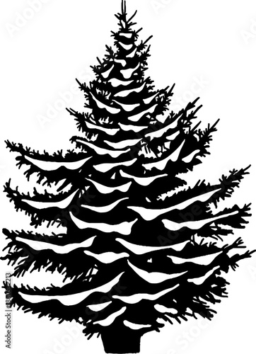 Spruce tree standing covered with falling snow