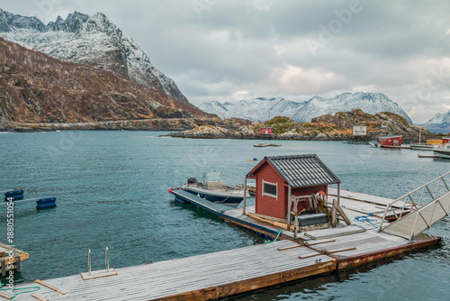 Cloudy day on the coast of Hamn, Norway, with dramatic rocky shoreline, rough sea waves, and an overcast sky creating a raw, atmospheric Nordic seascape shaped by wind and nature.