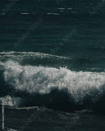waves crashing on rocks
