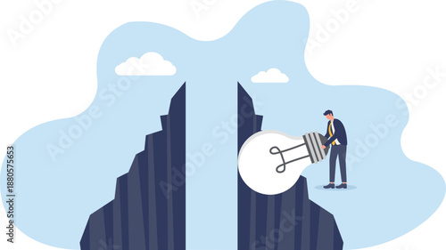 Businessman Fixing Idea Bulb Over Chasm