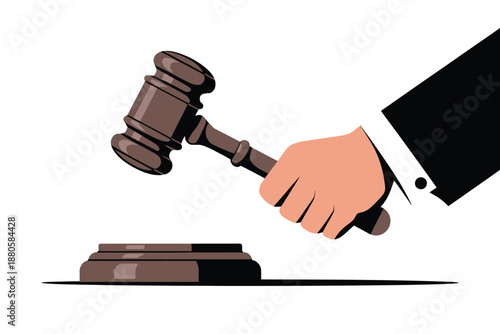 A hand in a business suit holding a gavel over a sound block