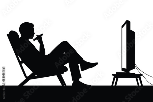 A man sitting in a chair watching TV and smoking a cigarette