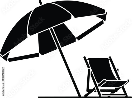 Black silhouette of a beach umbrella and a deck chair