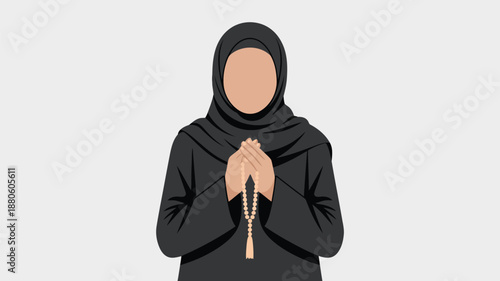 A devout Muslim woman wearing a black hijab gently clasps prayer beads in her hands