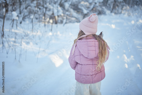 girl with yorkshire terrier in winter 