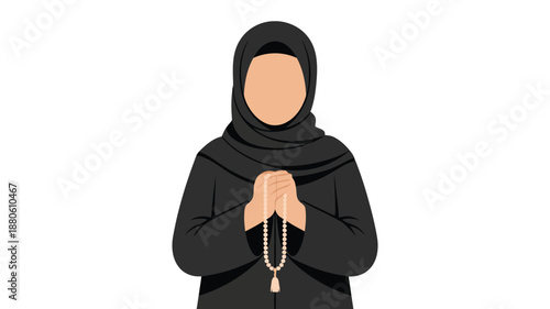 A serene Muslim woman dressed in a black hijab thoughtfully holds traditional Islamic prayer beads