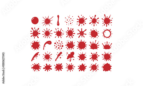 Dynamic assortment of red liquid splashes and drops creating artistic texture elements