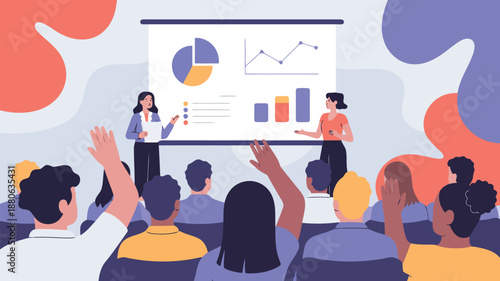 Two women present financial data and graphs to an engaged audience raising their hands during a workshop