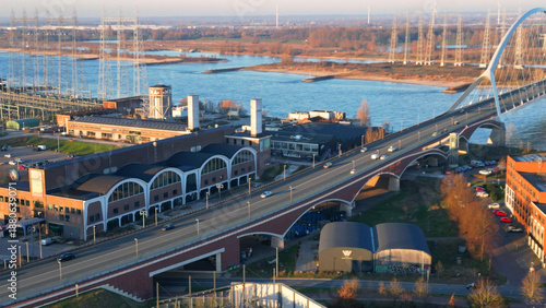 Nijmegen Cityscape from Above: Focusing on the Sleek Design of De Oversteek Bridge
