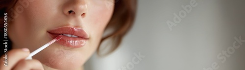 Glossy Lips Applying Nude Pink Lip Gloss Beauty and Cosmetics Macro