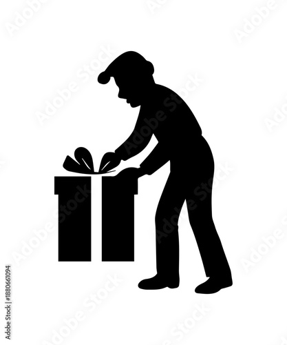 Elf silhouette tying bow on christmas gift box