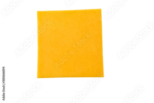 slices of tasty cheddar cheese isolated on a white background, top view.
