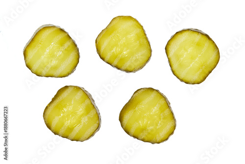 sliced marinated gherkins isolated on a white background. Top view.