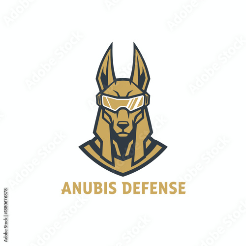 Futuristic gold Anubis head mascot with tech goggles for cyber security or tactical gaming brand identity with the text ANUBIS DEFENSE logo.