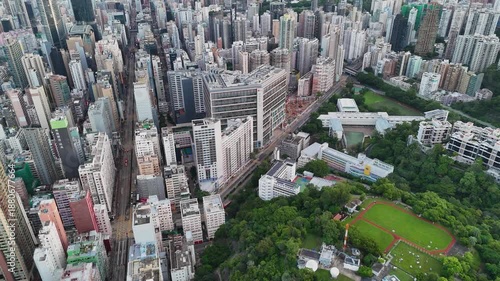 Wallpaper Mural Calm morning aerial drone view of Hong Kong, with skyscrapers glowing in soft light. Torontodigital.ca