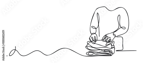 Continuous line drawing of a person folding laundry and organizing clothes for travel or home tidying concept for various lifestyle and domestic task applications