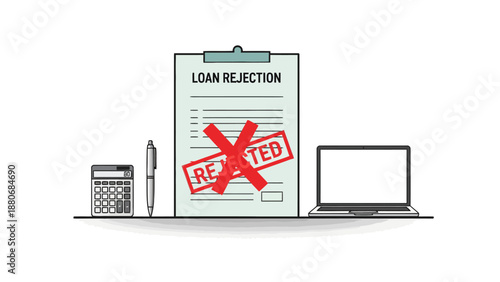 Loan rejection document with calculator pen and laptop