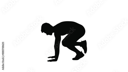 A black silhouette of a person crouching in a sprinters starting position on white background