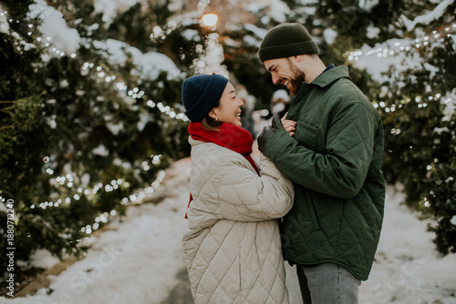 Joyful couple enjoys winter...