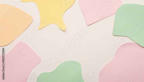 Colorful Shapes Made of Paper Arranged on a Light Background in a Creative Wo...