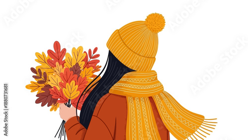 Autumn Scene: Person in Warm Hat and Scarf Holding Colorful Fall Leaves Bouquet