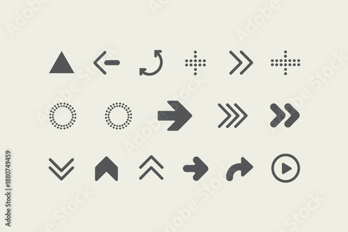 Collection of various gray arrows and symbols on a neutral background, perfect for interface design and navigation elements