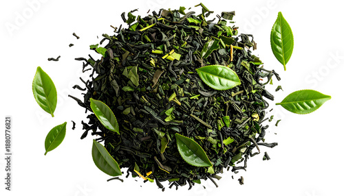 A vibrant overhead view of loose-leaf green tea with fresh leaves artfully arranged