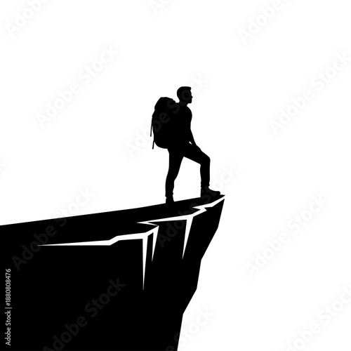 Man Standing on Cliff Edge with Backpack.