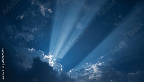 Sunlight streaming through dramatic clouds, illuminating the sky with a radiant, awe-inspiring glow