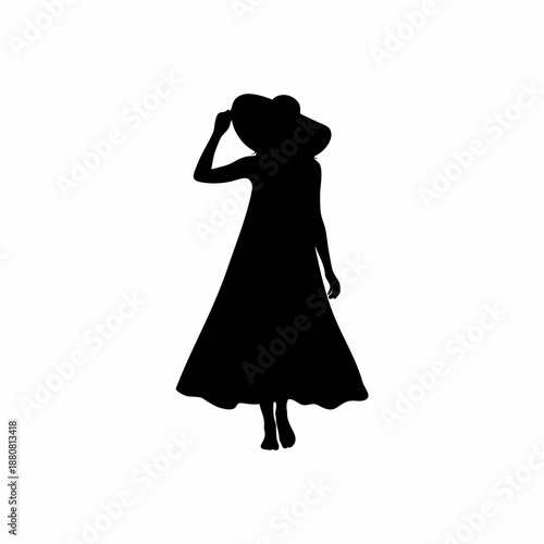 Silhouette of a Graceful Woman in Summer Maxi Dress and Wide Brim Hat