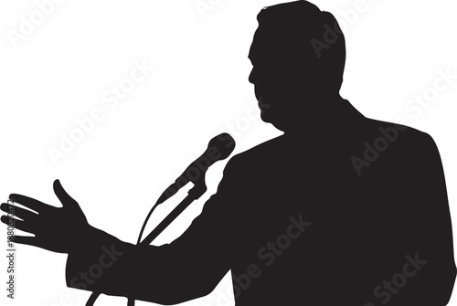 Silhouette of a man speaking at a microphone with open hands