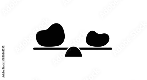 Balance scale with two stones.