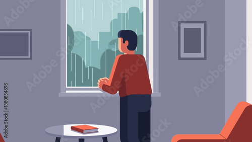 Man looking out window at rain, contemplating, perhaps feeling melancholic or introspective during a gloomy day indoors