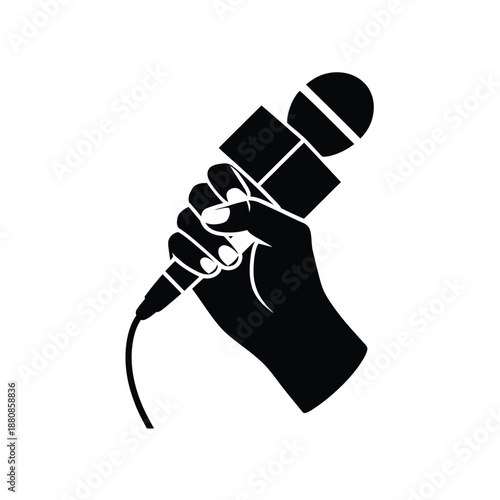 A hand firmly gripping a black microphone suggesting performance and sound