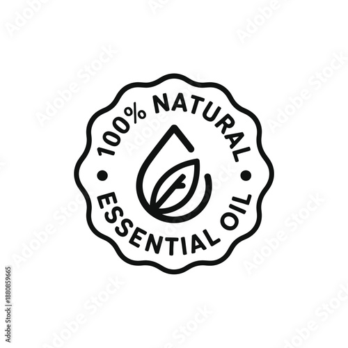 Circular emblem displaying 100 natural essential oil with a leaf illustration