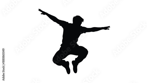Black silhouette of man jumping with arms outstretched