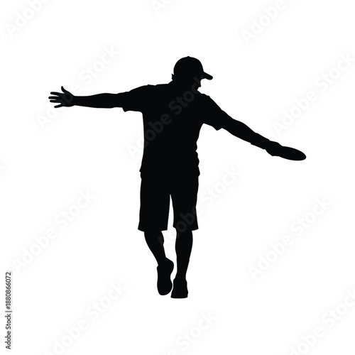 Man in black silhouette with outstretched arms and cap