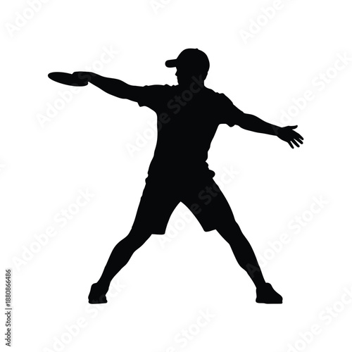 Man throwing frisbee in silhouette sports
